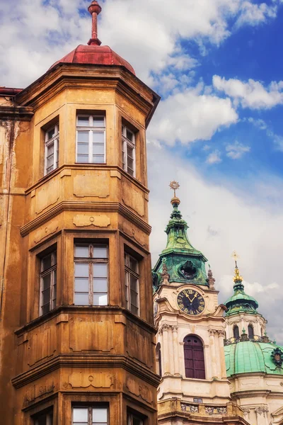 Prague Little Quarter architecture details with St. Nicholas Church in the background — Stock Photo, Image