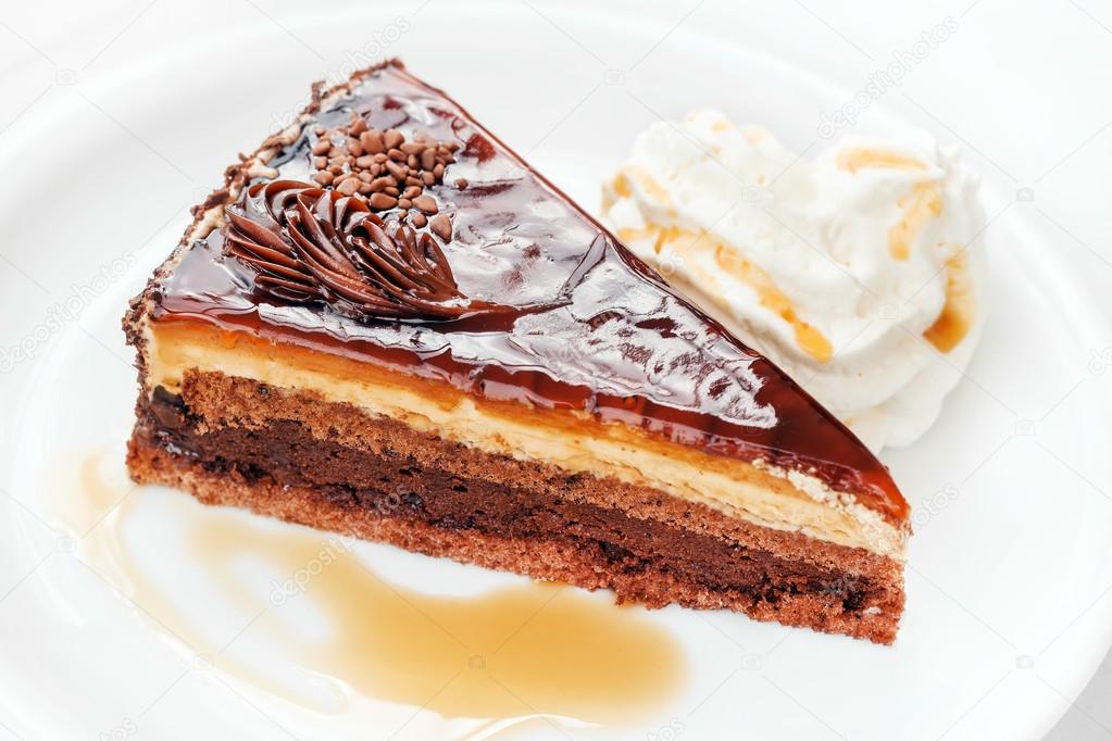 Chocolate & caramel cake with cream (shallow dof)
