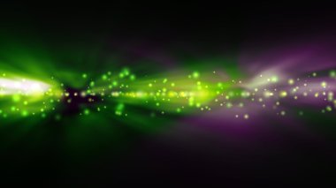 Arka plan bulanık parlak yeşil ve mor ışıklar ile