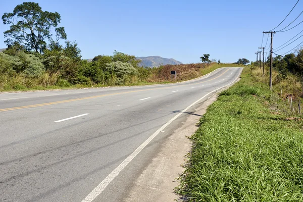 Estrada de asfalto rural — Fotografia de Stock