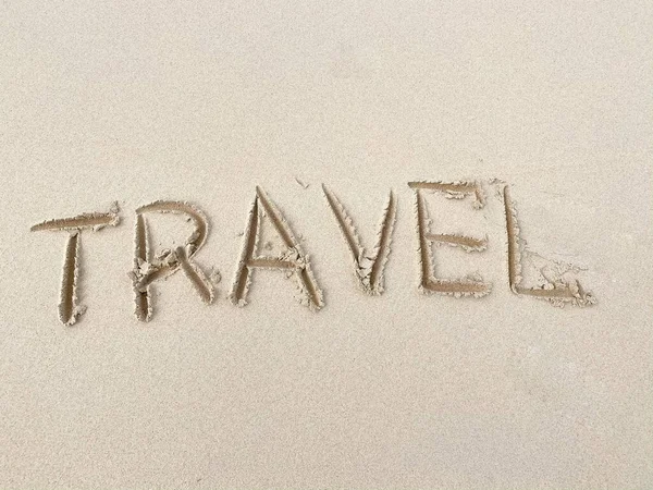 Travel inscription on summer sandy beach. Vacation and adventure concept — Stock Photo, Image