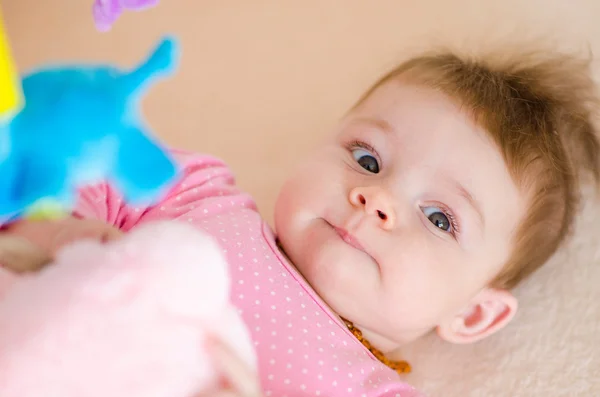 Baby in a cot — Stock Photo, Image