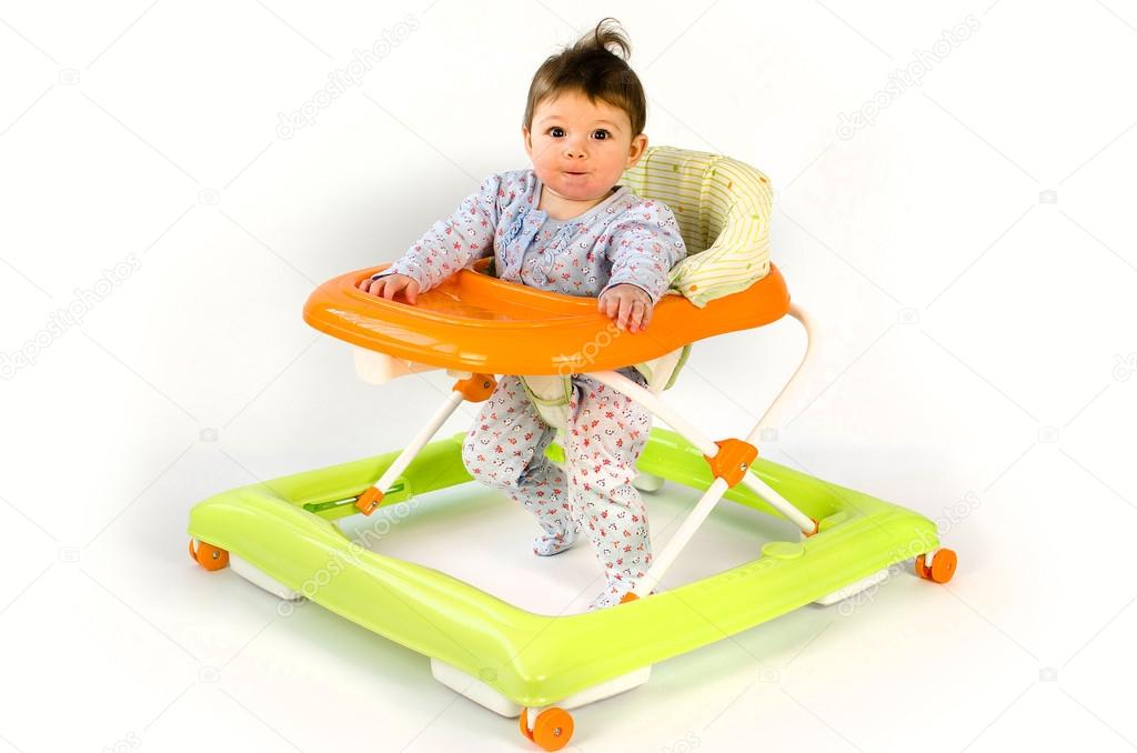 baby girl in a walker