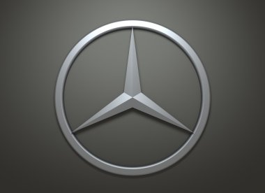 Koyu gri arka plan üzerinde Mercedes Benz amblemi.