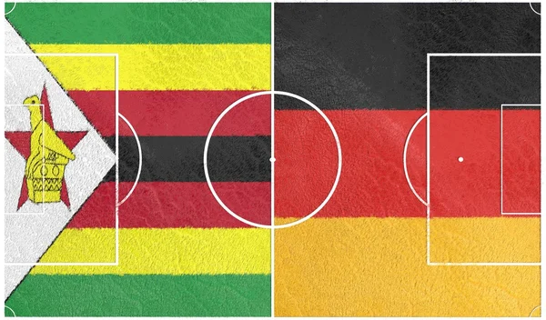 Zimbabwe vs Germany. Football field textured by flags — Stock Photo, Image