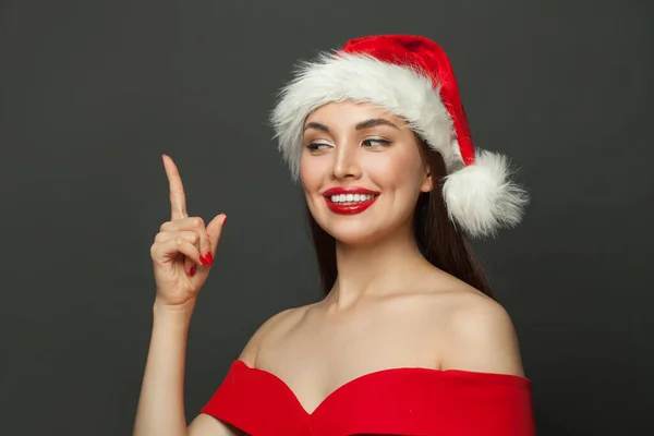 Christmas Woman Santa Hat Pointing Black Background Christmas Holiday New — Stock Photo, Image