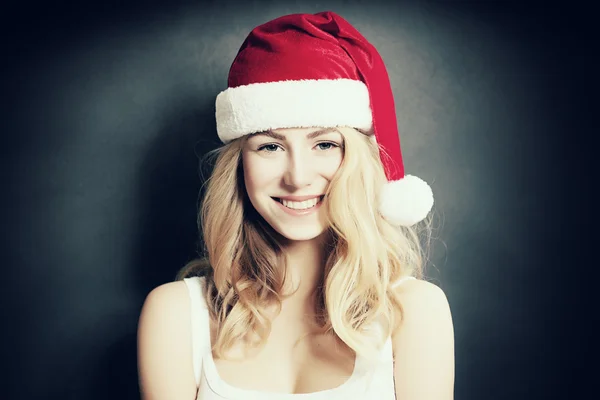 Boże Narodzenie kobieta śmiech. Xmas piękne moda Model w Santa Hat — Zdjęcie stockowe