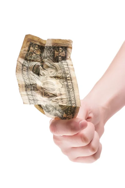 Рука держит рухнувший доллар — стоковое фото