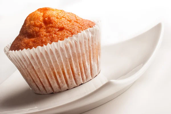 Muffin on white plate Stock Photo