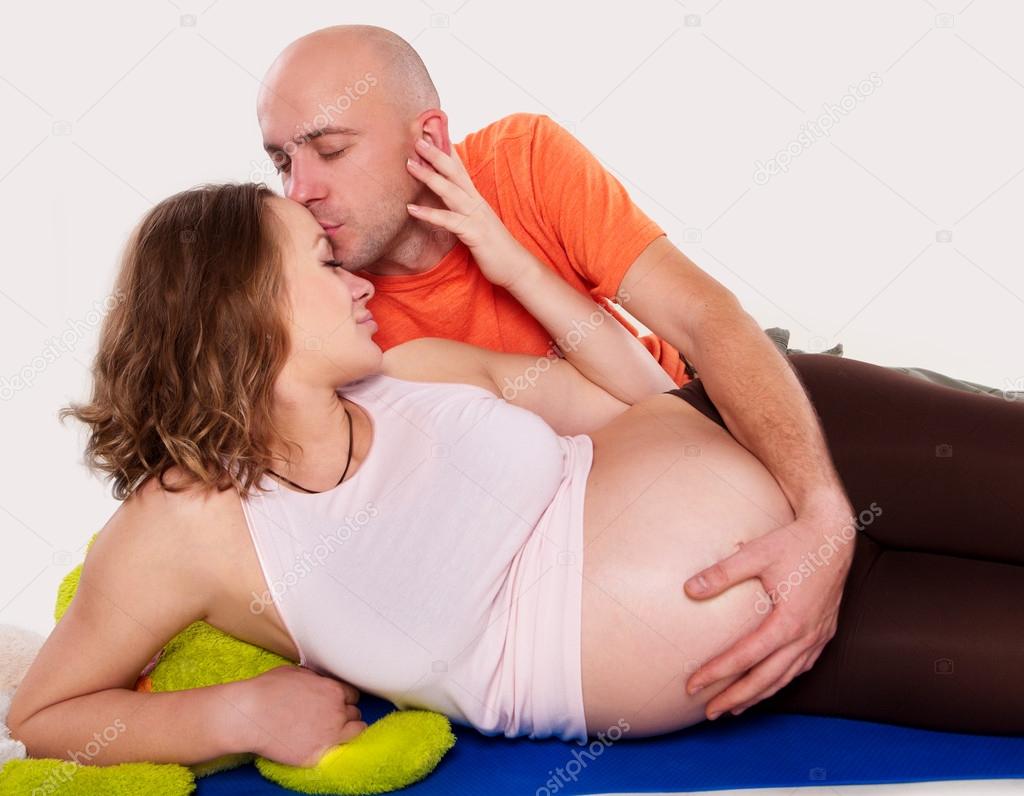 The pregnant woman with her husband