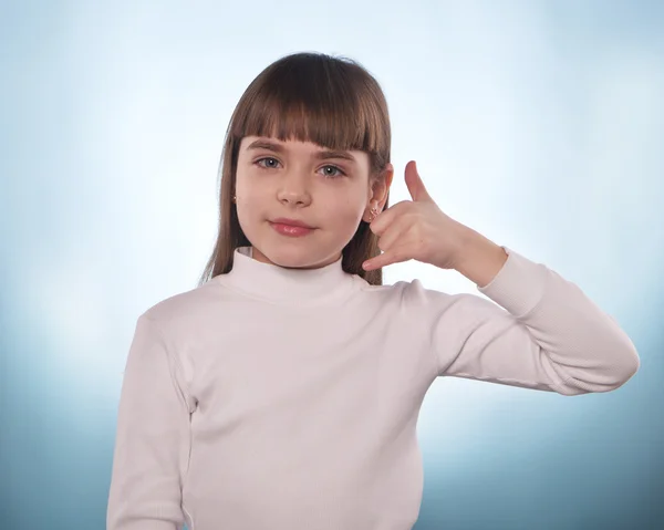 La jeune fille avec l'index en bas ou en haut isolé — Photo