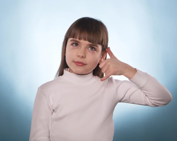 La jeune fille avec l'index en bas ou en haut isolé — Photo