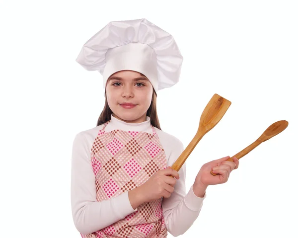 Дівчина з капелюхом шеф-кухаря вказує ізольовано — стокове фото