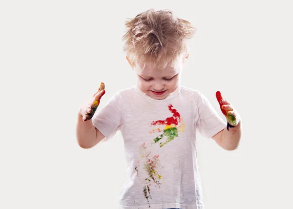 The baby boy with  gouache soiled hands and shirt isolated — Stock Photo, Image