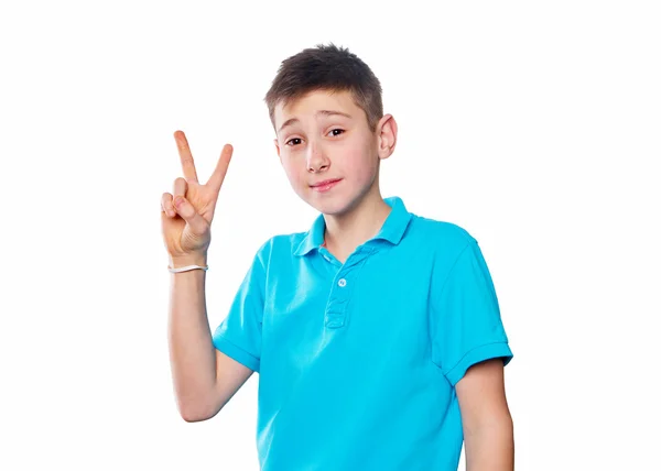 Portrait of a boy pointing finger showing emotions expressive  on a white background with a blue shirt — Stock Photo, Image