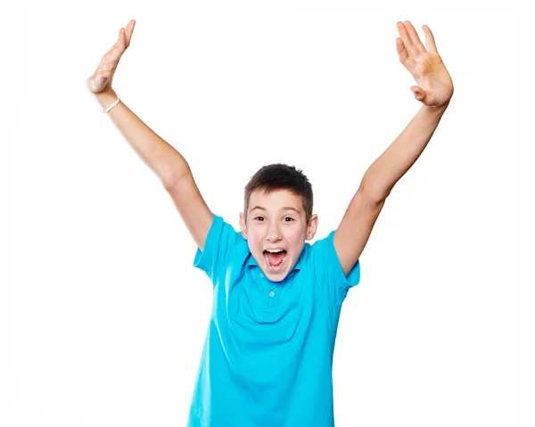 Retrato de um menino apontando o dedo mostrando emoções expressivas em um fundo branco com uma camisa azul — Fotografia de Stock