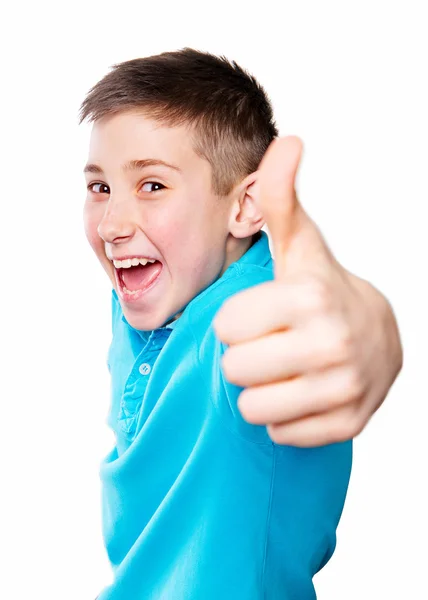 Retrato de um menino apontando o dedo mostrando emoções expressivas em um fundo branco com uma camisa azul — Fotografia de Stock