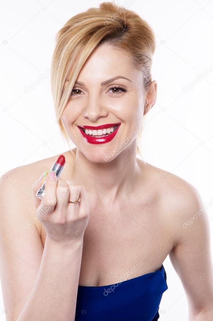 The beautiful  blonde woman with lipstick isolated