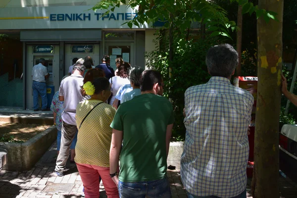 Line of people greek bank — Stok fotoğraf