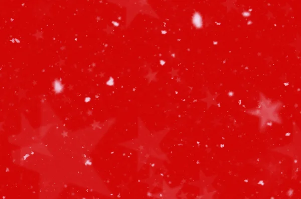 Snö stjärnor röd bakgrund — Stockfoto