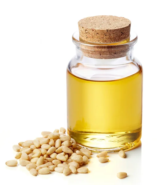 Pine nut oil and pine nuts — Stock Photo, Image