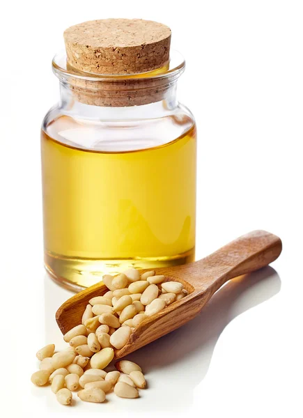 Pine nut oil and pine nuts — Stock Photo, Image