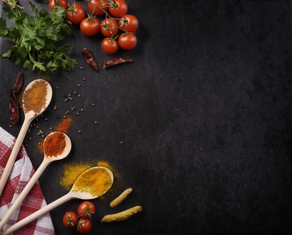 Spices on black background — Stock Photo, Image