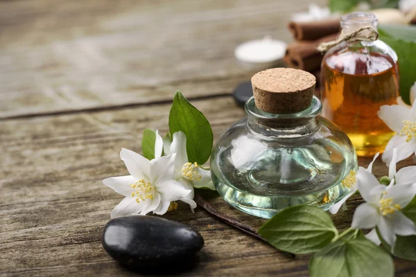 Essential Oils on wooden table — Stock Photo, Image