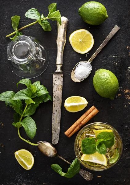 Mojito ingredients on black rustic table — Stock Photo, Image
