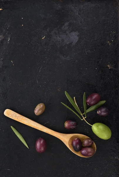 Olives on black background — Stock Photo, Image