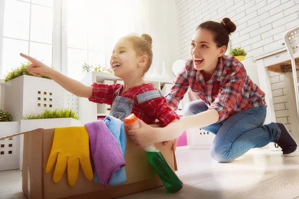 family cleans the room