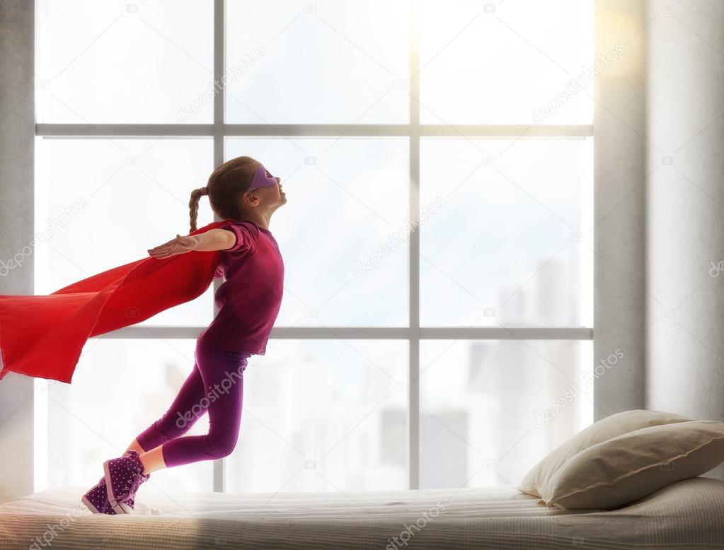 girl in an Superman's costume