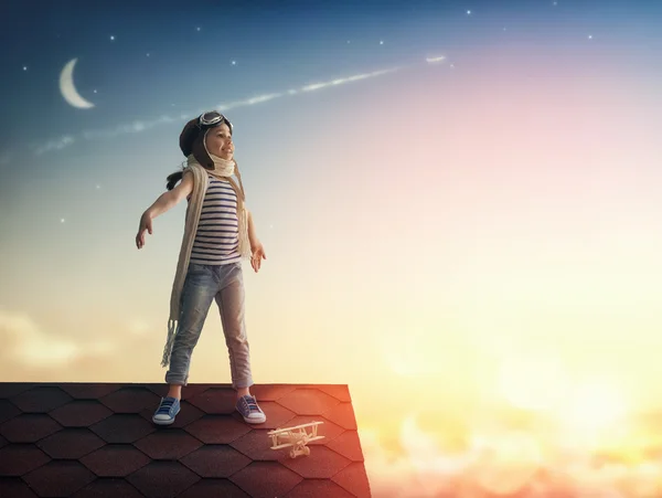 Child playing with toy airplane — Stock Photo, Image