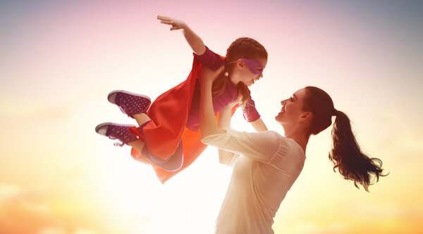 Mother and her child playing