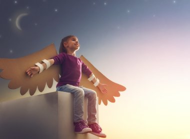 Bir kuş kanatları ile çocuk