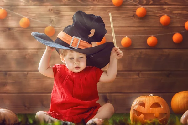 Baby girl in witch costume — Stock Photo, Image