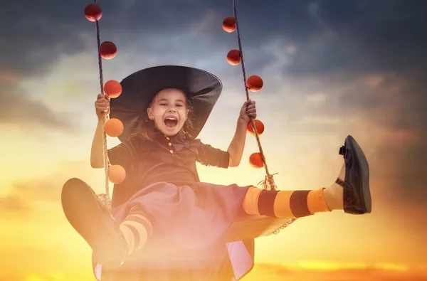 Little witch outdoors — Stock Photo, Image