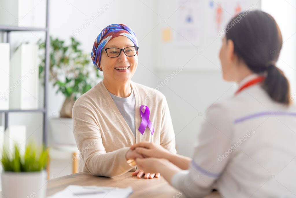 February 4 World Cancer Day. Female patient listening to doctor in medical office. Raising knowledge on people living with tumor illness.