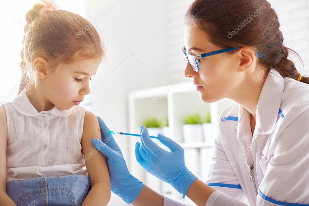 a vaccination to a child