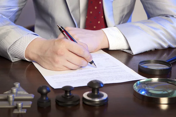 Notary signs the documents from our office — Stock Photo, Image