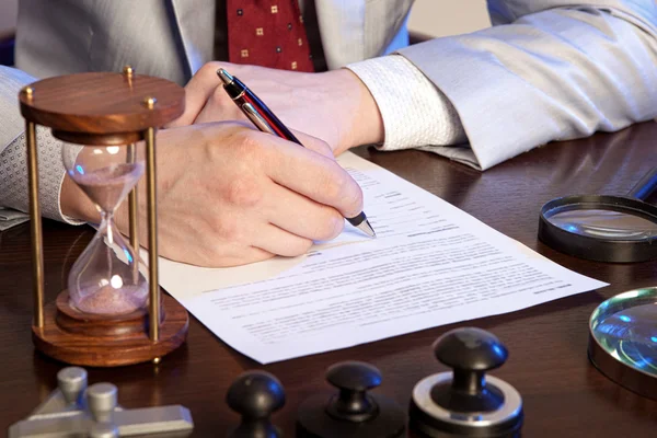 Notary signs the documents from our office — Stock Photo, Image