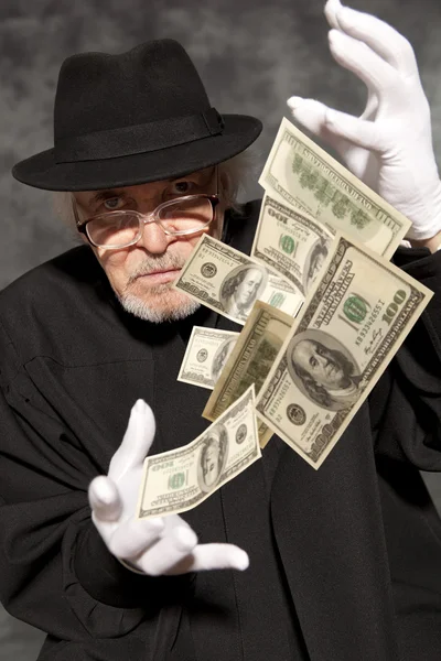 Magician show with dollars banknote — Stock Photo, Image