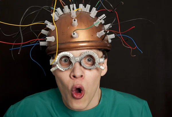 Cheerful inventor helmet for brain research — Stock Photo, Image