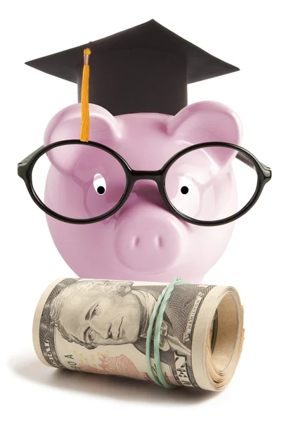 Piggy bank with graduation hat — Stock Photo, Image