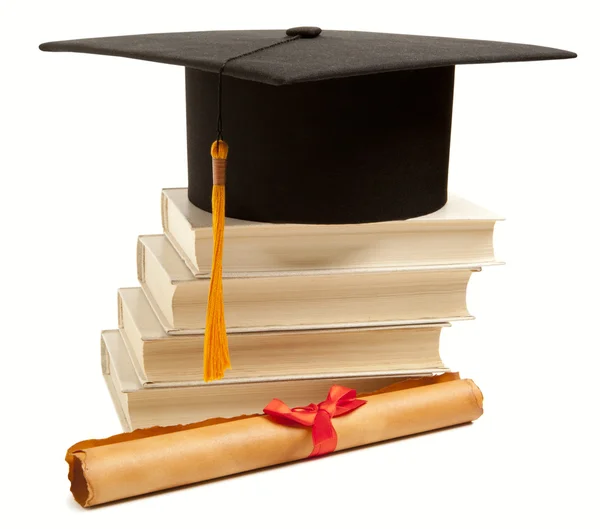 Graduation hat, book and diploma — Stock Photo, Image