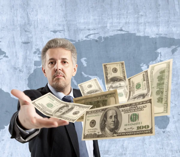 นักธุรกิจโยนดอลลาร์ — ภาพถ่ายสต็อก