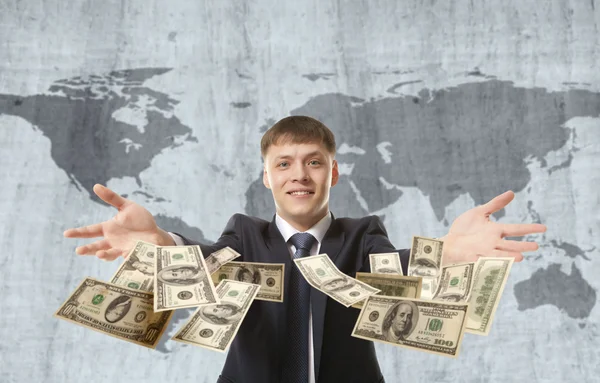 Businessman throwing dollar — Stock Photo, Image