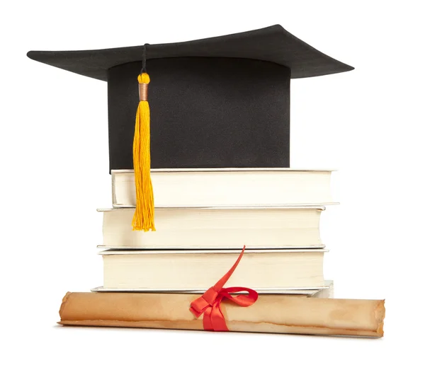 Graduation hat and diploma — Stock Photo, Image