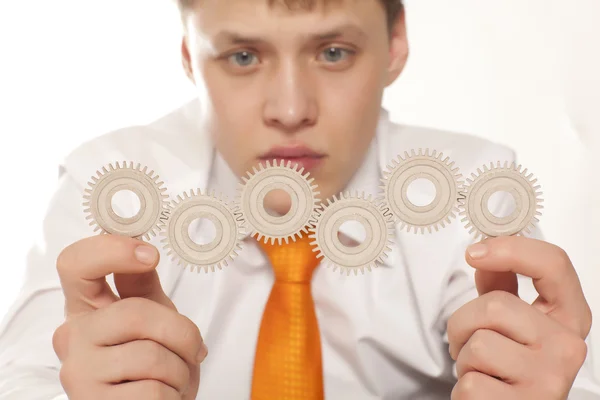 Hombre de negocios con rueda dentada —  Fotos de Stock