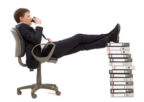Empresario descansando en sillón —  Fotos de Stock